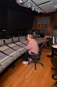 The producer sits at the console in Studio A control room.
